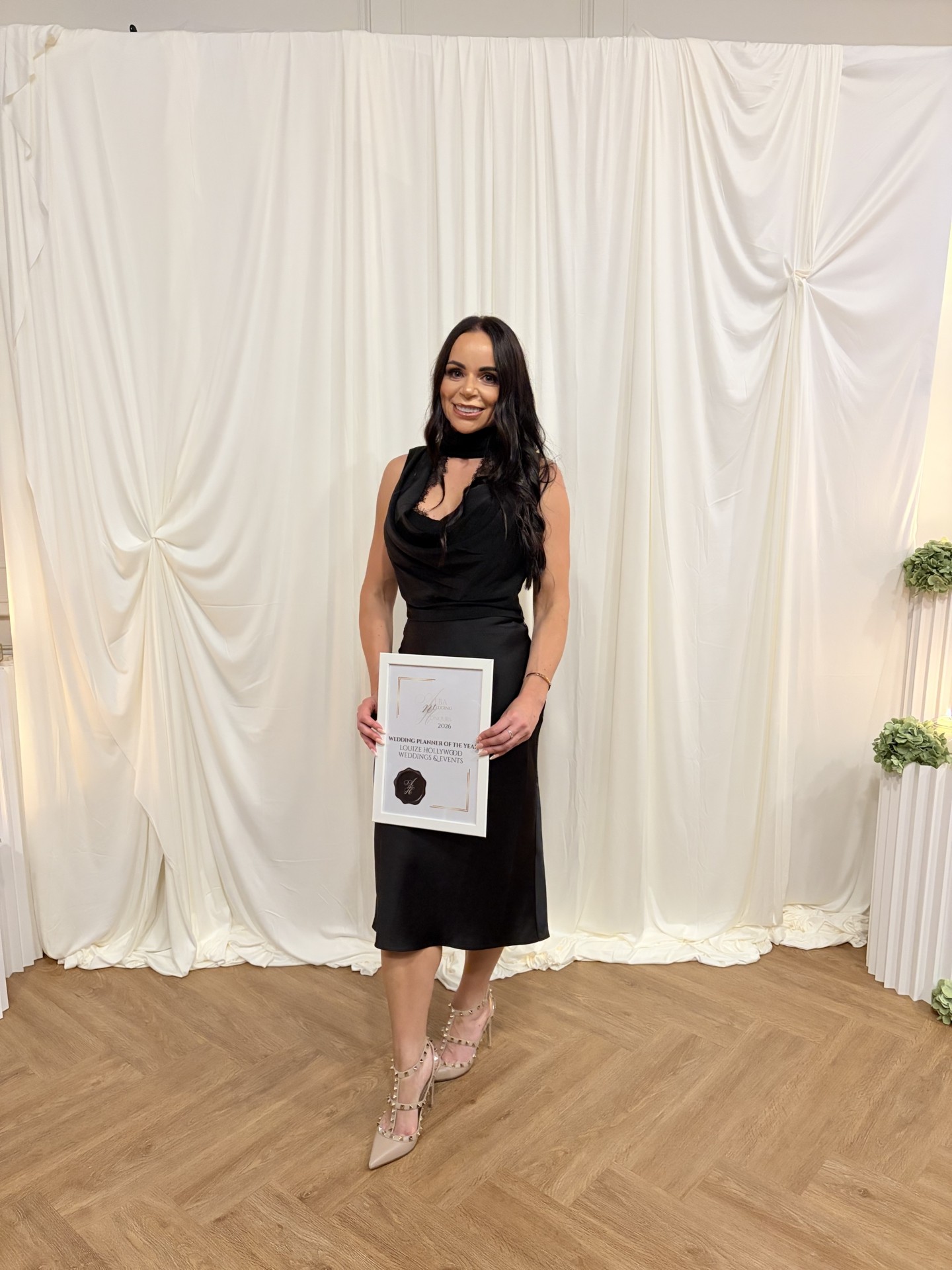 Wedding Planner of the Year 2026 certificate Louize Hollywood holding her Wedding Planner of the Year 2026 certificate.